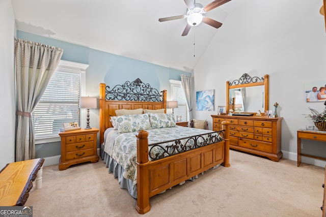 bedroom featuring light colored carpet, ceiling fan, and lofted ceiling