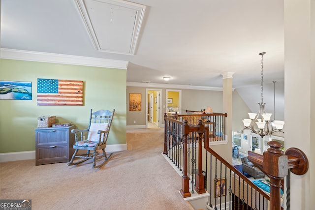 hallway featuring crown molding, light colored carpet, and a notable chandelier