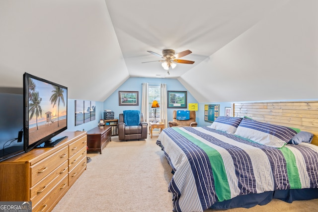 carpeted bedroom featuring ceiling fan and lofted ceiling