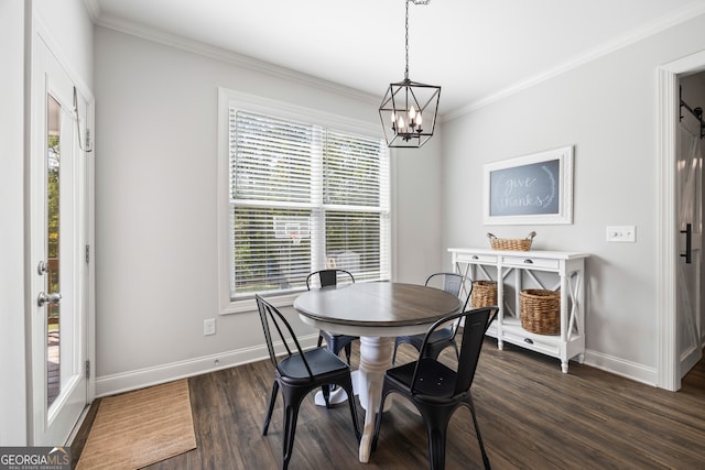 dining room featuring a chandelier, dark wood-type flooring, and ornamental molding