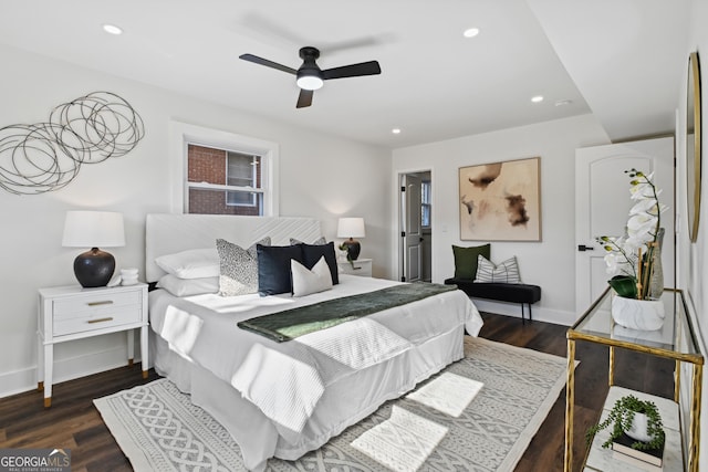 bedroom with dark wood-type flooring and ceiling fan