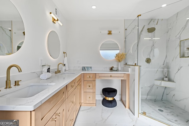 bathroom featuring vanity and an enclosed shower