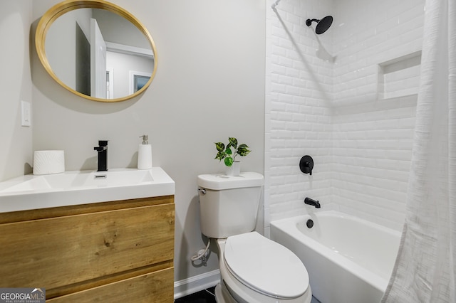 full bathroom featuring shower / bath combination with curtain, vanity, and toilet