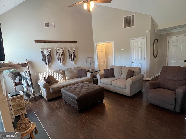 living room featuring dark hardwood / wood-style flooring, high vaulted ceiling, and ceiling fan