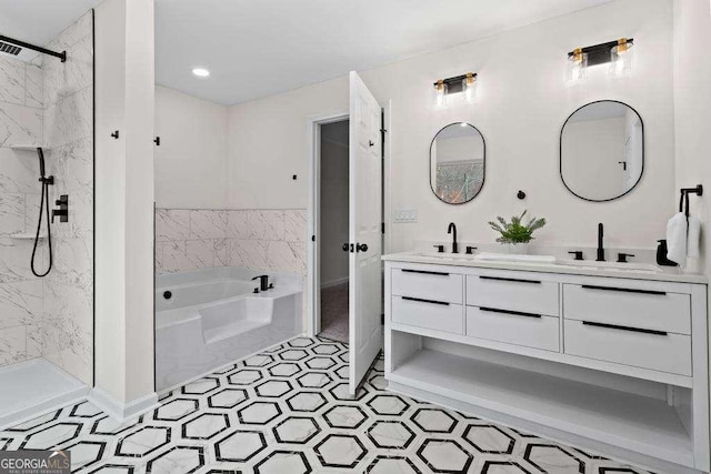 bathroom with tile patterned flooring, vanity, and independent shower and bath