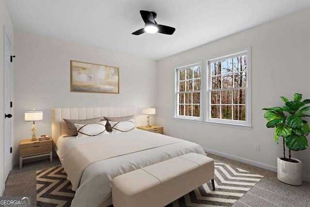 carpeted bedroom with ceiling fan