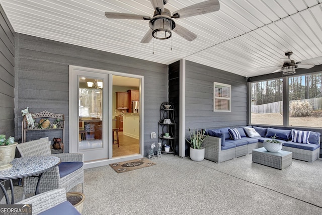 exterior space with ceiling fan