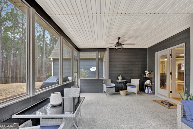 sunroom / solarium with ceiling fan