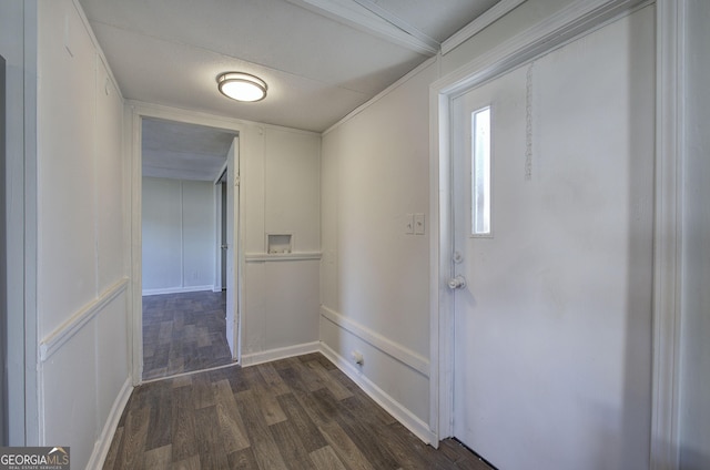 corridor with dark hardwood / wood-style flooring