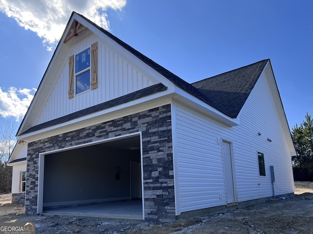 view of property exterior with a garage