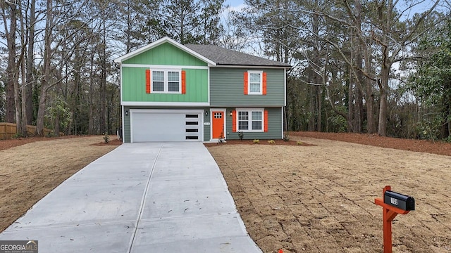 view of front of property featuring a garage