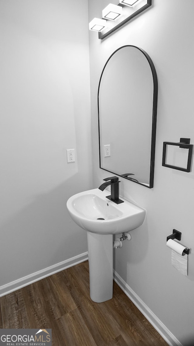 bathroom featuring hardwood / wood-style flooring