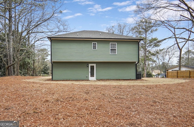 back of property featuring central air condition unit