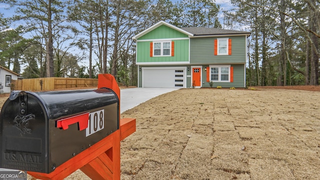 view of front of property with a garage