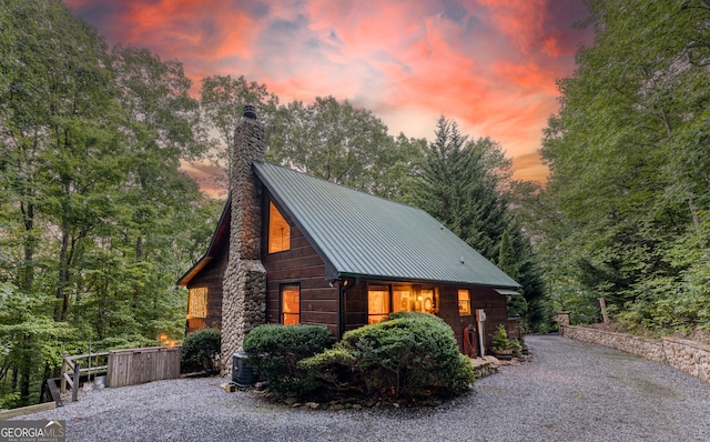 view of property exterior at dusk