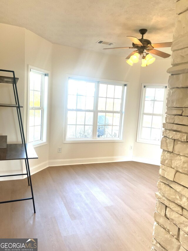 unfurnished bedroom with dark wood-type flooring