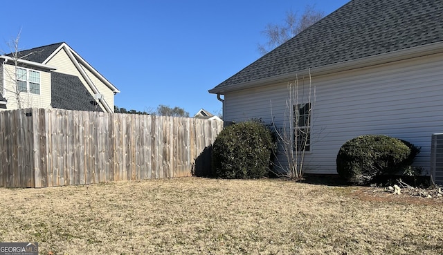 view of property exterior with a lawn