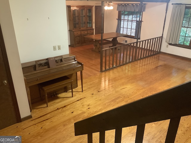 dining area with a chandelier and hardwood / wood-style floors