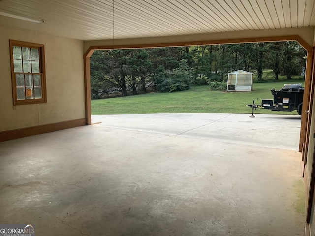 view of patio / terrace with a storage unit