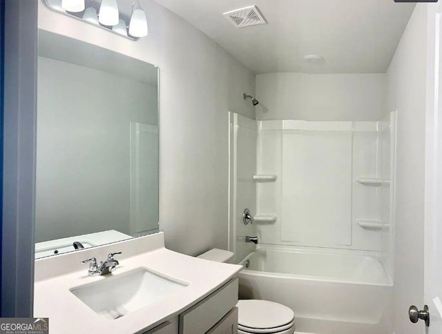 full bathroom featuring vanity, toilet, and bathing tub / shower combination