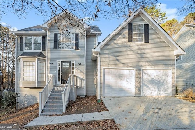 front of property with a garage