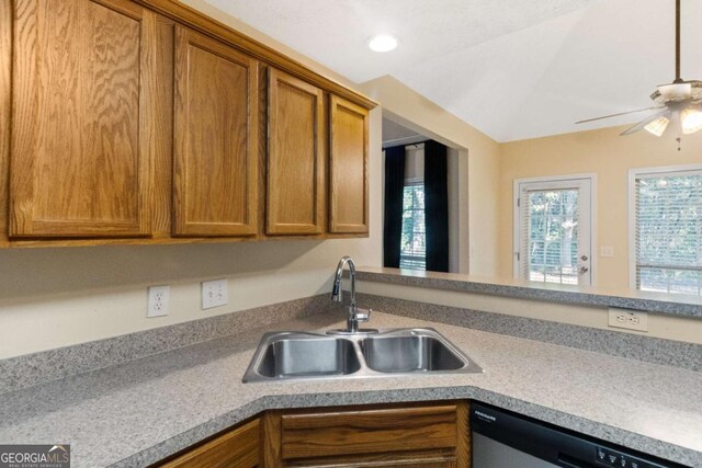 kitchen with dishwasher, ceiling fan, and sink