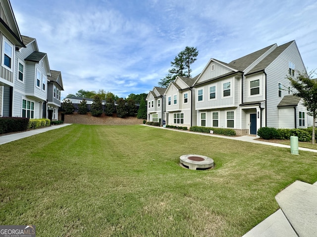 exterior space with a fire pit