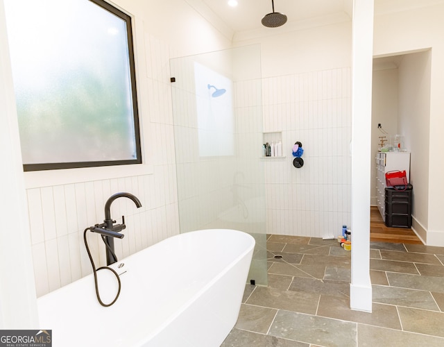 bathroom with separate shower and tub and crown molding