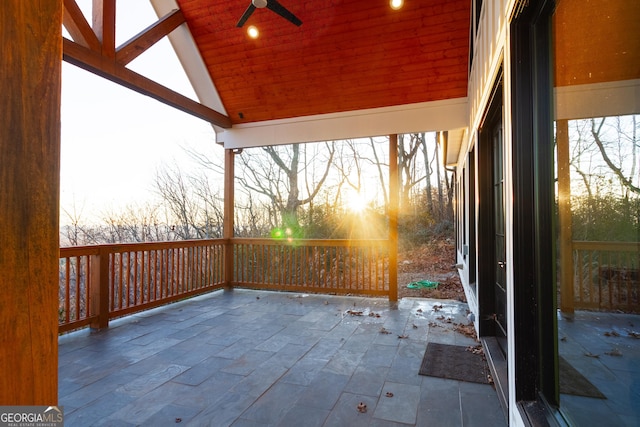 patio terrace at dusk with ceiling fan