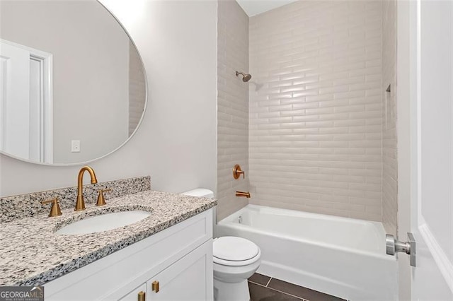 full bathroom featuring vanity,  shower combination, toilet, and tile patterned flooring