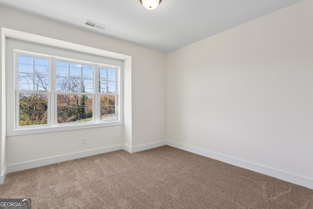 view of carpeted spare room