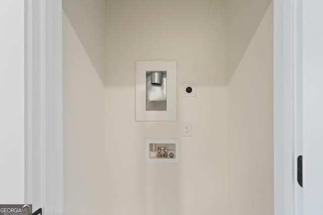 laundry room featuring hookup for a washing machine and electric dryer hookup