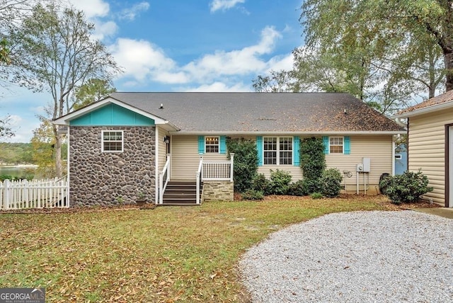 view of front of home with a front lawn