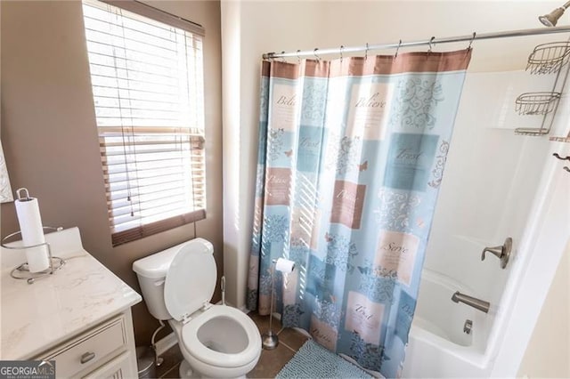 full bathroom featuring shower / tub combo with curtain, vanity, and toilet