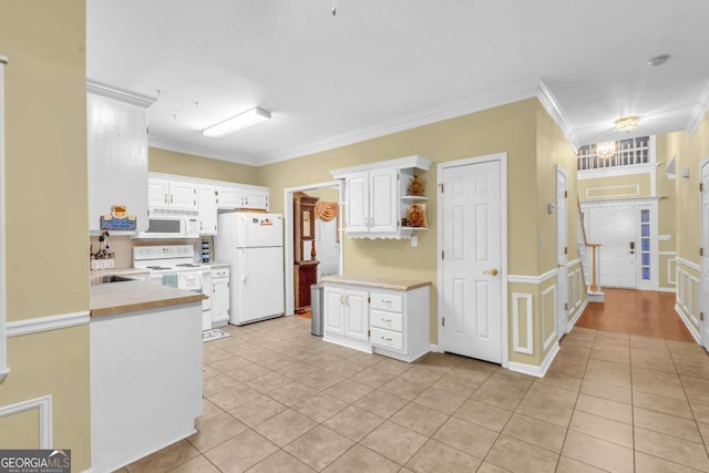 kitchen featuring white cabinetry, kitchen peninsula, white appliances, light tile patterned floors, and ornamental molding