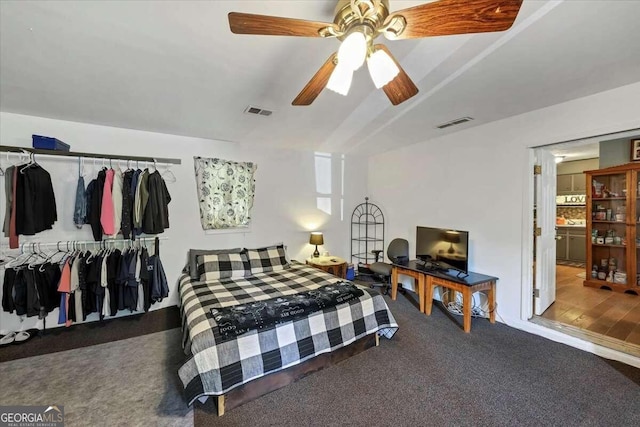 carpeted bedroom featuring ceiling fan