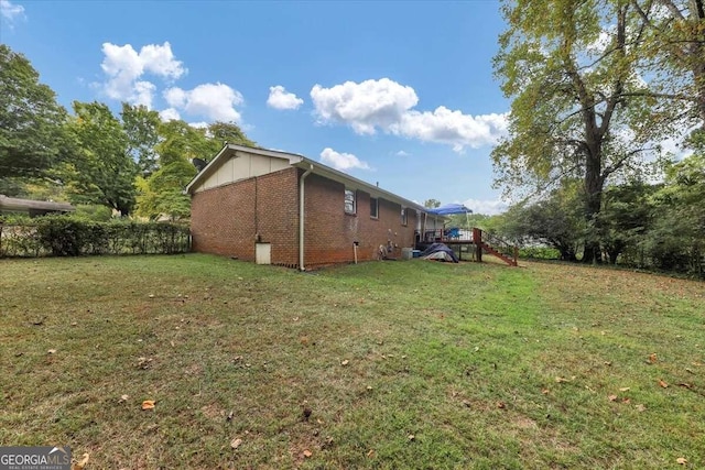 view of property exterior featuring a yard