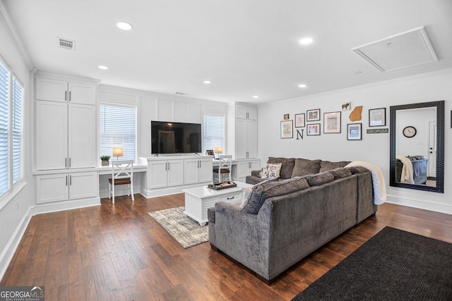 living room featuring dark hardwood / wood-style flooring and ornamental molding