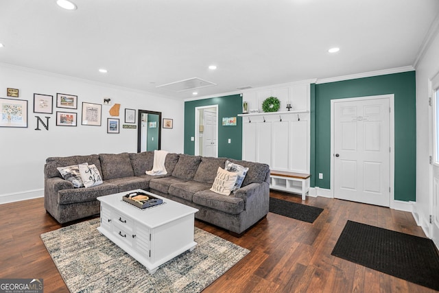 living room with crown molding and dark wood-type flooring