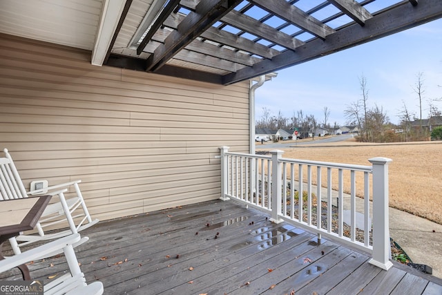 wooden deck featuring a pergola