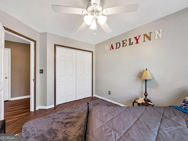 bedroom featuring a closet, ceiling fan, and dark wood-type flooring