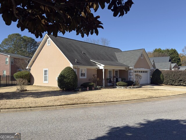 view of front of home featuring a garage