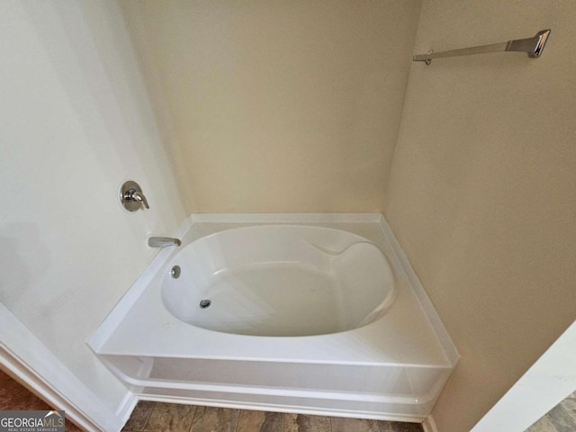 bathroom with a bathing tub