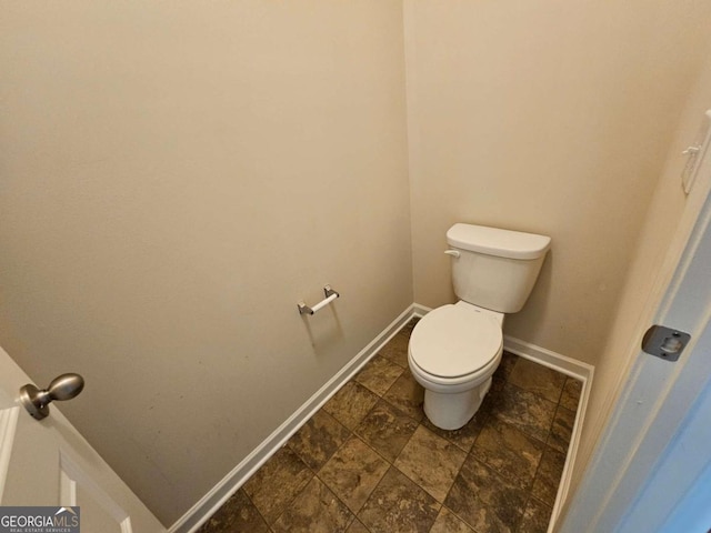 bathroom featuring toilet