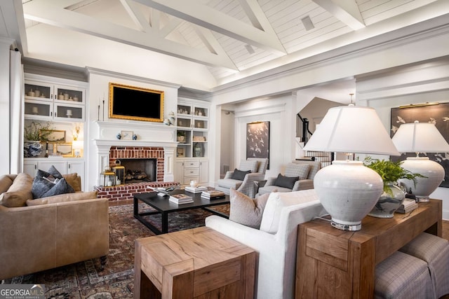 living room featuring vaulted ceiling with beams, built in features, and a fireplace