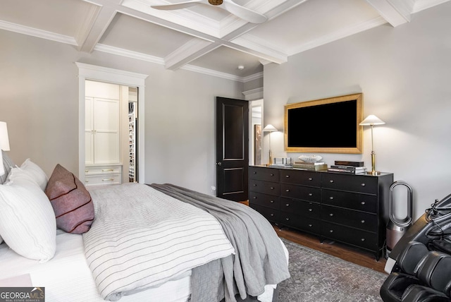 bedroom with coffered ceiling, ceiling fan, dark hardwood / wood-style flooring, crown molding, and beam ceiling