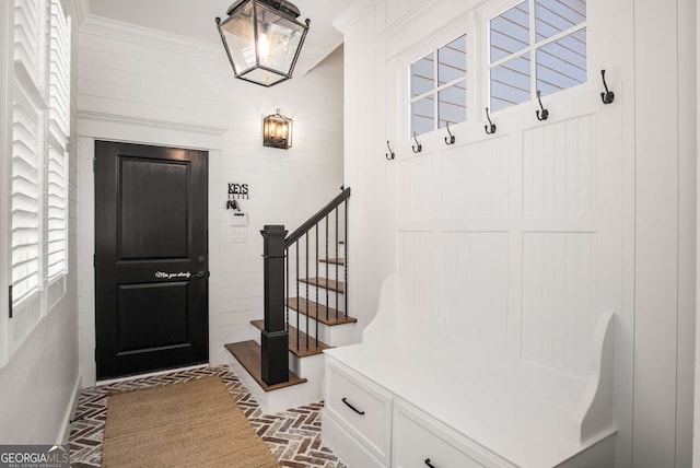 mudroom with crown molding