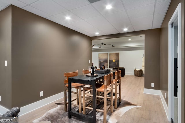 dining area with light hardwood / wood-style floors