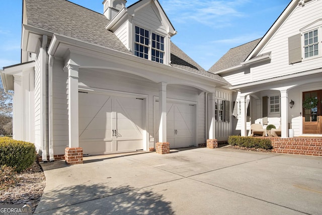 view of side of property featuring a garage