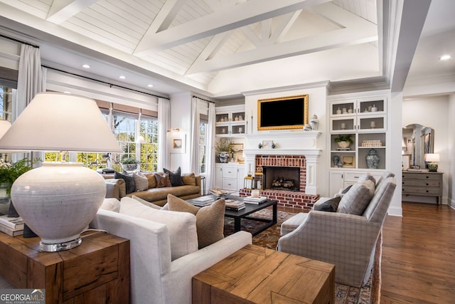 living room featuring dark wood-type flooring, vaulted ceiling with beams, and a fireplace